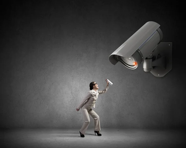 Camera keep an eye on woman — Stock Photo, Image