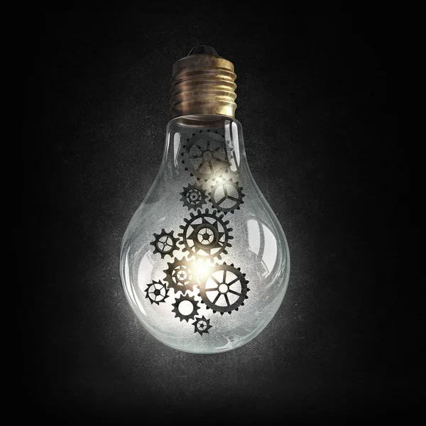 Electric bulb with gear wheels — Stock Photo, Image