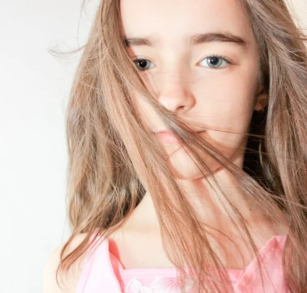 Young girl and windy hair — Stock Photo, Image