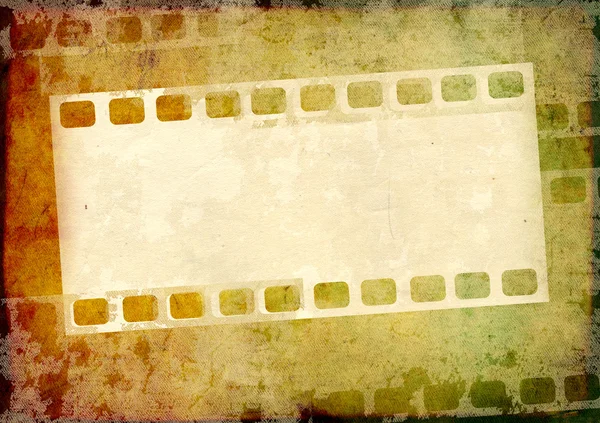 Grunge background with filmstrip — Stock Photo, Image