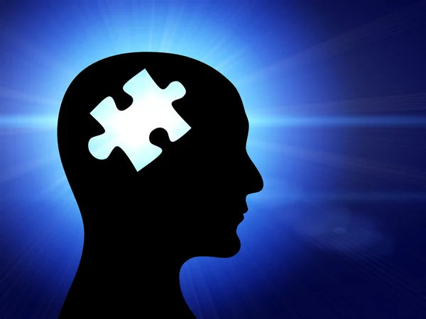 Lidský profil a mozek v podobě puzzle — Stock fotografie