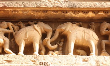 Famous elephants sculptures at temple, Khajuraho, India clipart