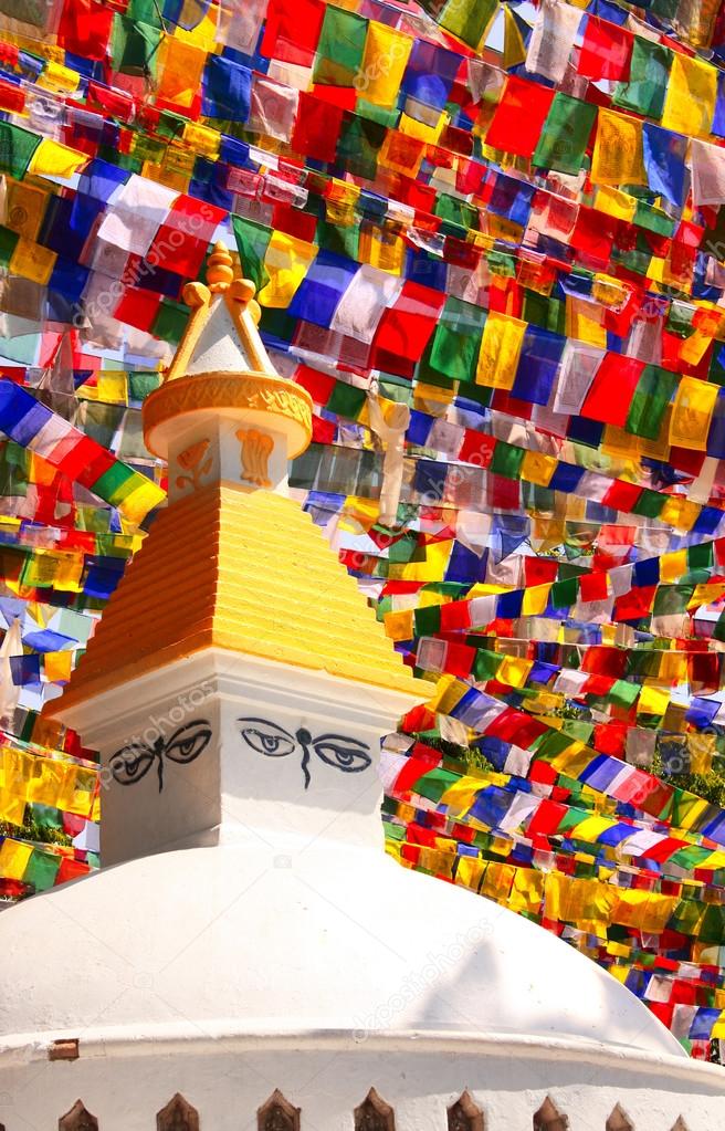 Stupa with Buddha eyes and prayer flags, Kathmandu, Nepal