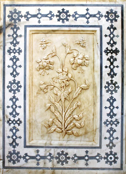 Antigua flor tallada en mármol en Amber Fort, Jaipur, Rajasthan —  Fotos de Stock