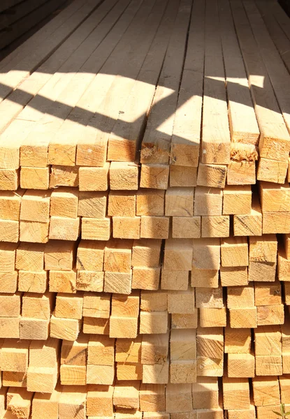 Wooden boards in a warehouse — Stock Photo, Image