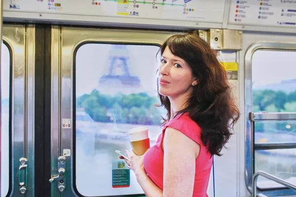 Young French woman in Parisian subway — Stockfoto