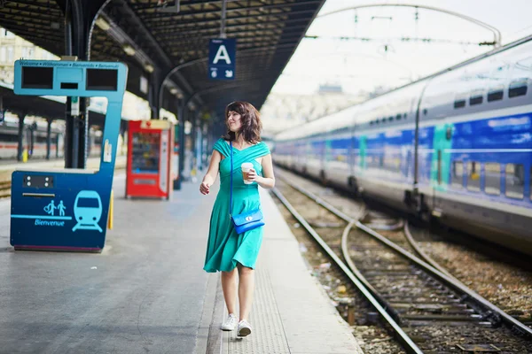 Young woman in Parisian underground or railway station — Stock Photo, Image