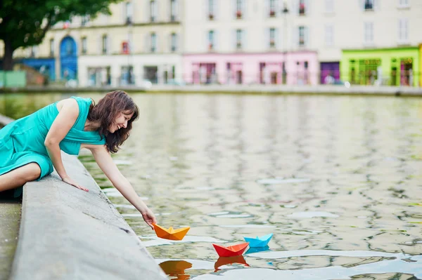 Cheerful young French woman having fun on Saint-Martin canal — Stock Photo, Image