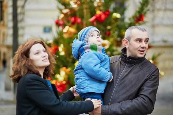 Happy family of three outdoors at Christmas — Stock Photo, Image