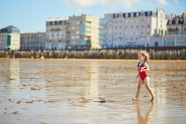 Adorable Toddler Girl Red Swimsuit Playing Wooden Toy Boat Water — Stock Photo, Image