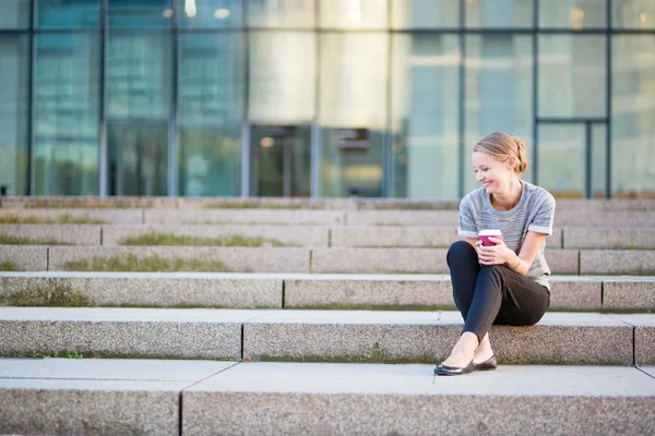 Young beautiful woman having her coffee break — Stock Photo, Image