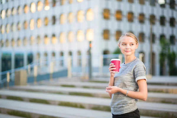 Young beautiful woman having her coffee break — Stock Photo, Image