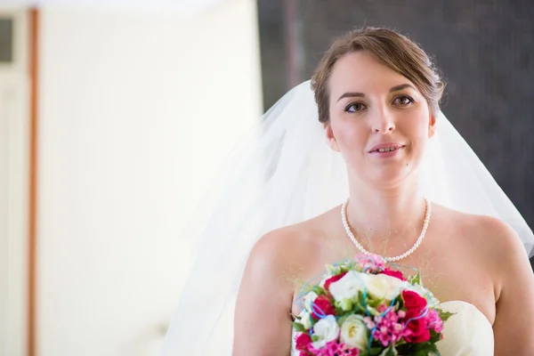 Bride holding beautiful wedding bouquet — Stock Photo, Image