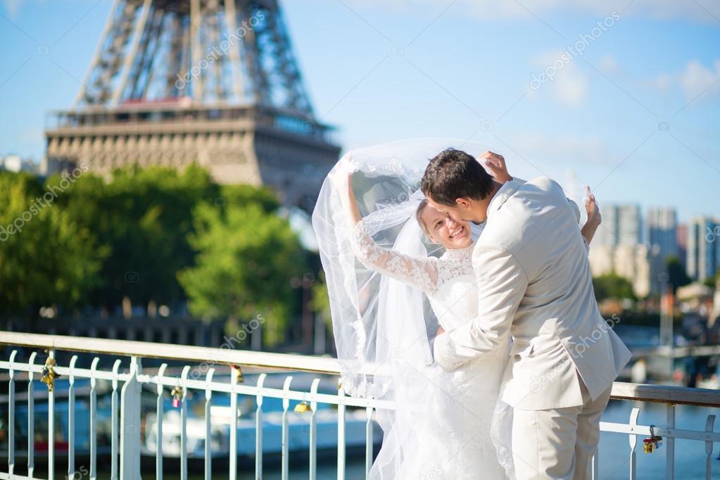 Bride and groom in Paris, near the Eiffel tower