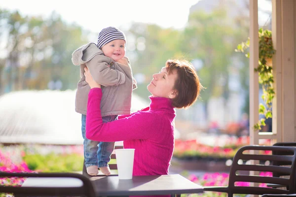 Grandmother and grandson in cafe — Stock Photo, Image