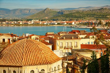 Bird view of central Nafplion with red tile roofs clipart