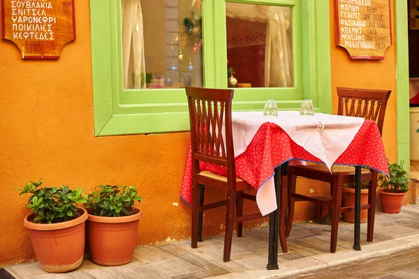 Beautiful street cafe in greek town Nafplion — Stock Photo, Image