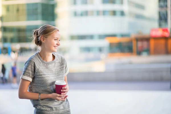 Young woman having her coffee break — Stock Photo, Image