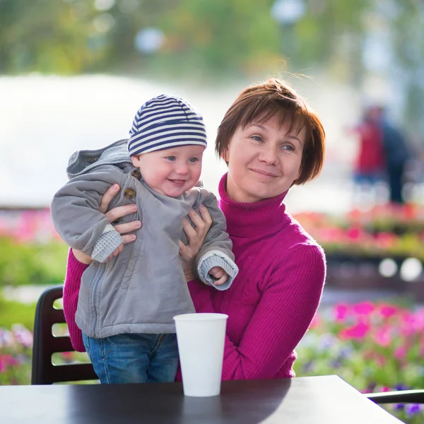 Middle aged woman and her little grandson — Stock Photo, Image