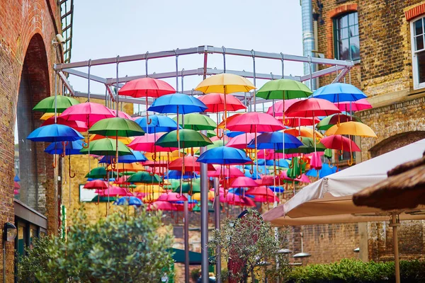 Colorful umbrellas on a street of London — Stock Photo, Image