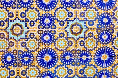 Wall decorated with mosaics in Marrakech clipart