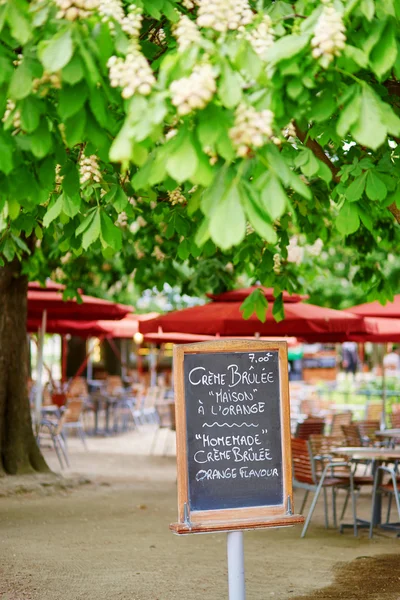 Menu on board in French outdoor restaurant — Stock Photo, Image