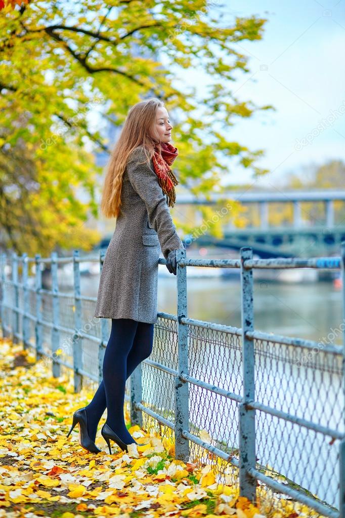 Young girl in Paris on a fall day Stock Photo by ©encrier 74577965