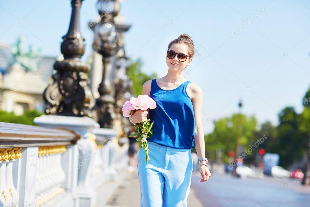 Young woman in Paris on a summer day