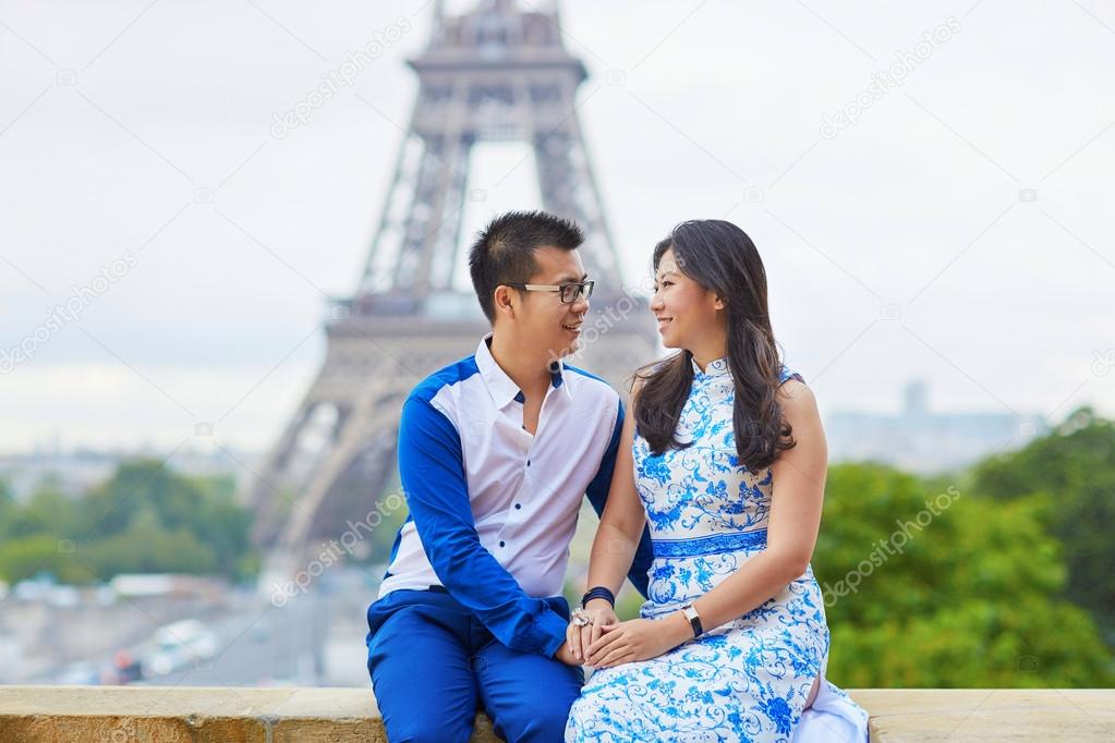 Young romantic Asian couple in Paris