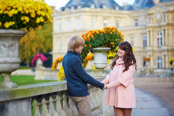 Young dating couple in Paris on a bright fall day Royalty Free Stock Photos