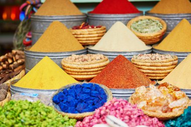 Selection of spices on a traditional Moroccan market in Marrakech, Morocco clipart