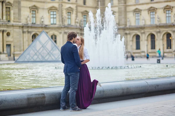 Beautiful couple having a date in Palais Royal in Paris — Stock Photo, Image