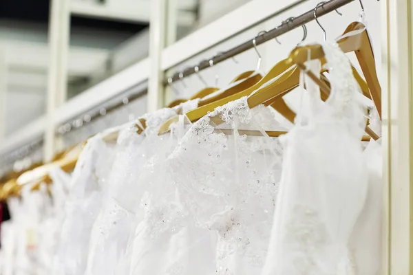 Collection of wedding dresses in the shop — Stock Photo, Image