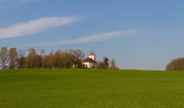 Small church on a field. — Stock Photo, Image