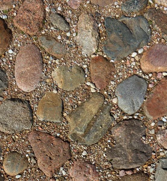 Kullerstensbelagda trottoaren bakgrund. — Stockfoto