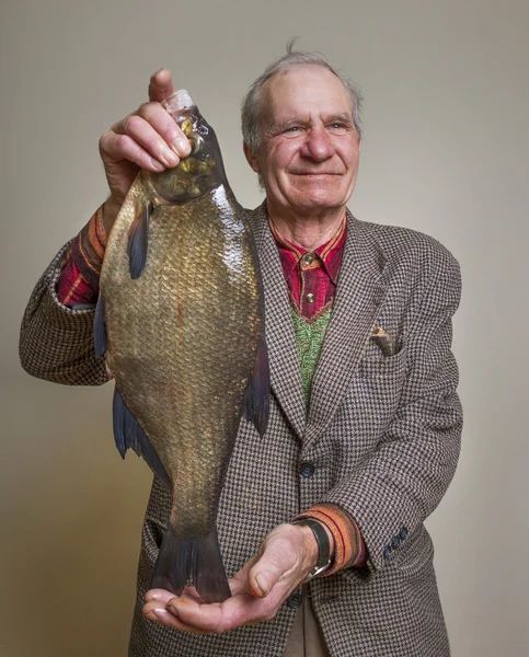 Uomo con pesce . — Foto Stock