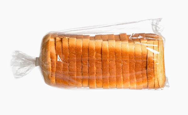 Sliced bread on white surface. — Stock Photo, Image