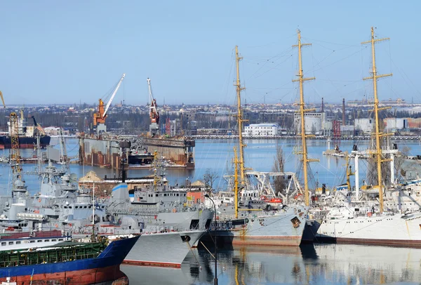 Naval ships moored in military harbor of Odessa - largest Ukrainian sea port on Black Sea,Europe — стокове фото