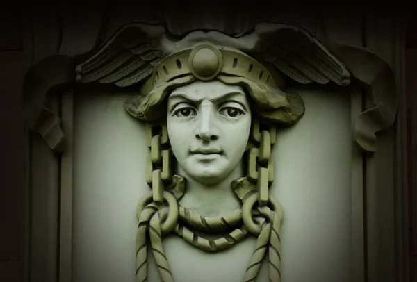 Beautiful head of Mercury (Hermes) ,ancient god of commerce in greek and roman mythology ,old architectural decoration,art nouveau style — Stock Photo, Image