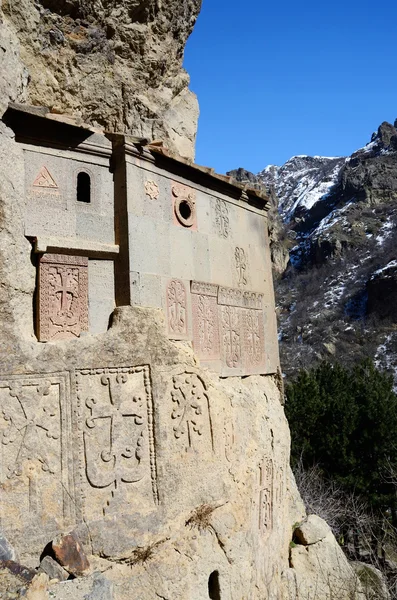 Cells of Geghard rock monastery with ancient khachkars - memorable crosses, ,Armenia, Caucasus, unesco world heritage site — Stock Photo, Image