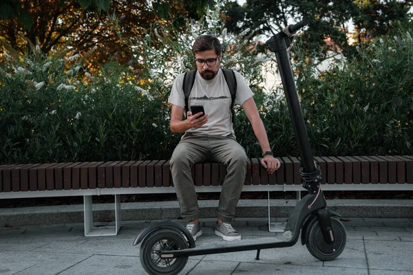 Hipster Man Commuter Electric Scooter Outdoors City Using Smartphone Young — Stock Photo, Image