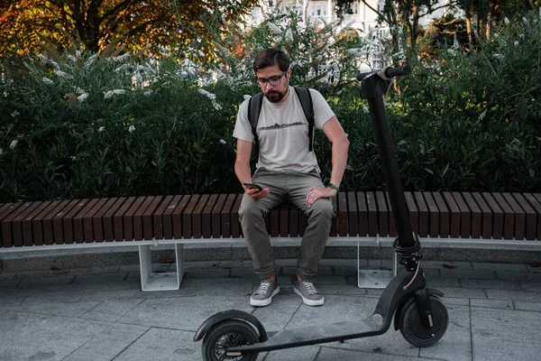 Hipster Man Commuter Electric Scooter Outdoors City Using Smartphone Young — Stock Photo, Image