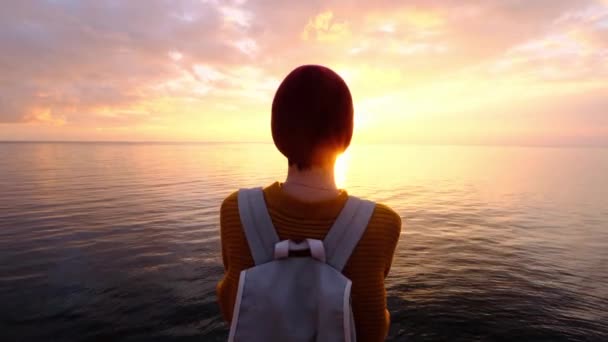 Zpět Pohled na mladou ženu a pomalu se přibližující oceán. — Stock video