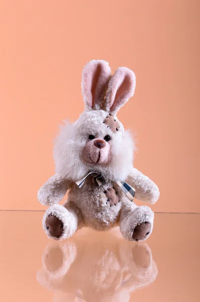 Soft toy on beige bakground. Handmade — Stock Photo, Image