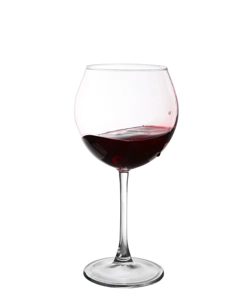 Red wine swirling in a goblet wine glass, isolated on a white ba — Stock Photo, Image