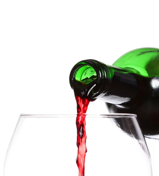 Red wine pouring on white background, closeup — Stock Photo, Image