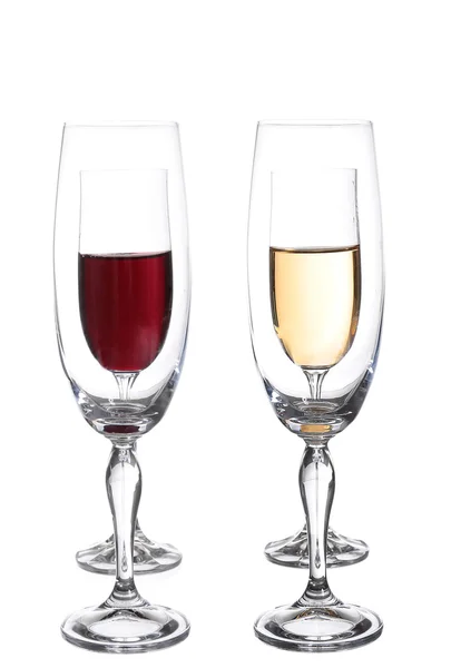 Full and empty champagne glasses with red and white wine — Stock Photo, Image