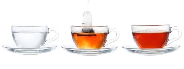 Набор чашек с чаем изолированы на белом фоне . — стоковое фото