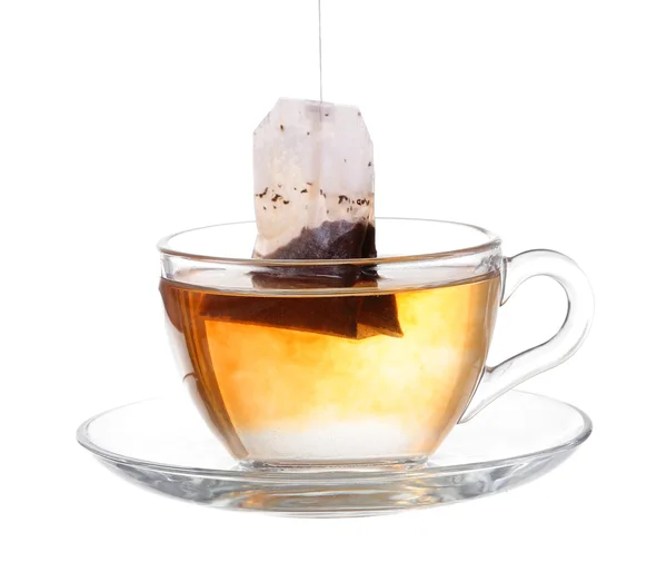 Склянка чаю з мішком Кінець. Ізольовані на білому тлі, з відсічним контуром — стокове фото