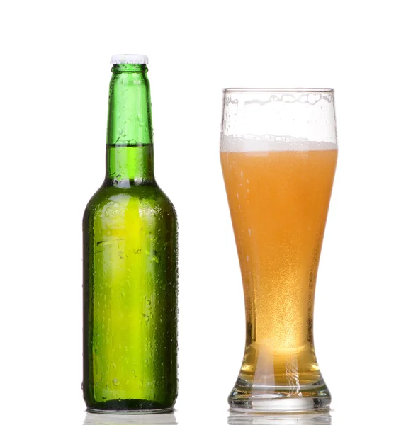 Chilled green bottle with condensate and a glass of beer lager on Isolated white background — Stock Photo, Image